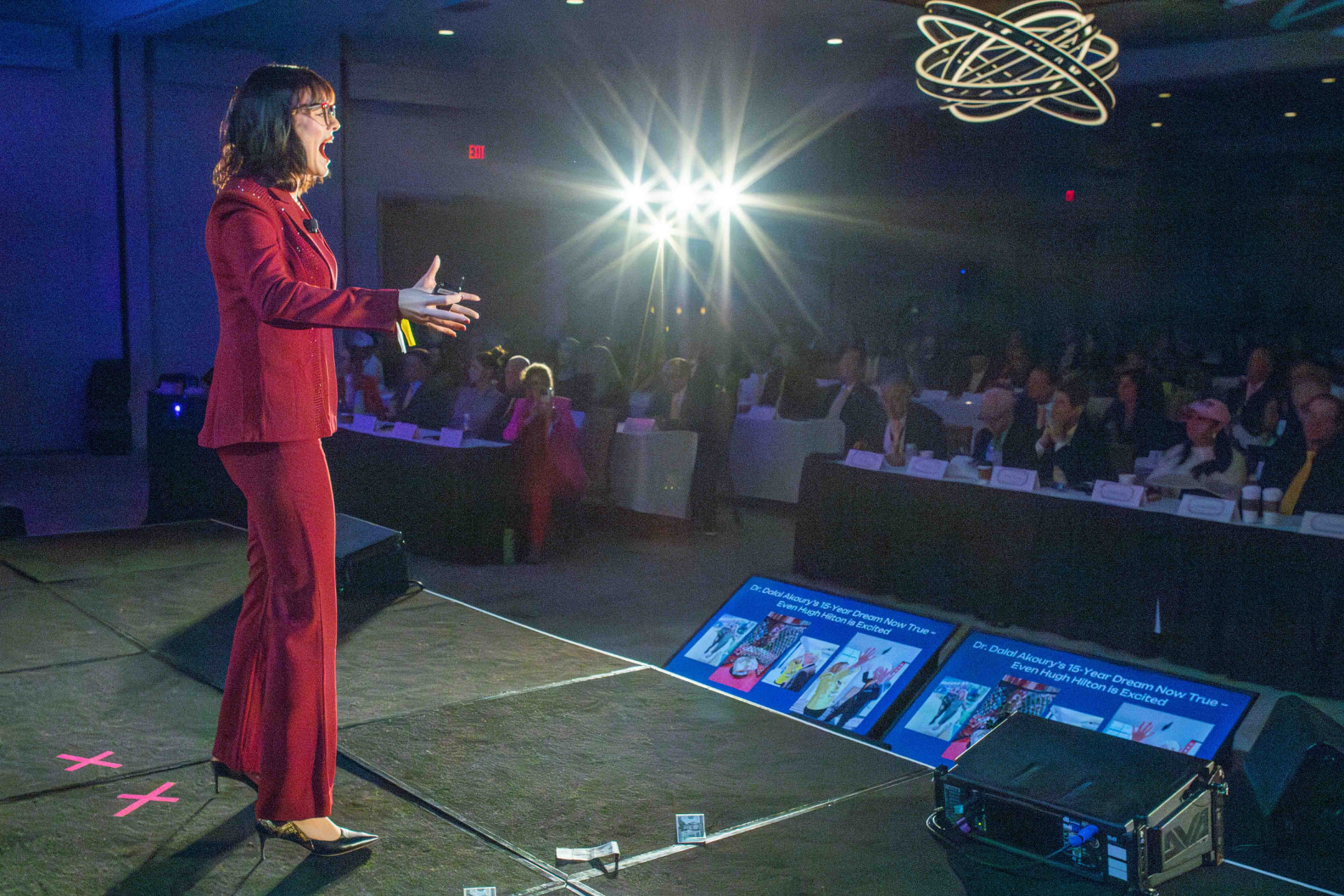 Janine Jakob speaking with energy to a conference audience