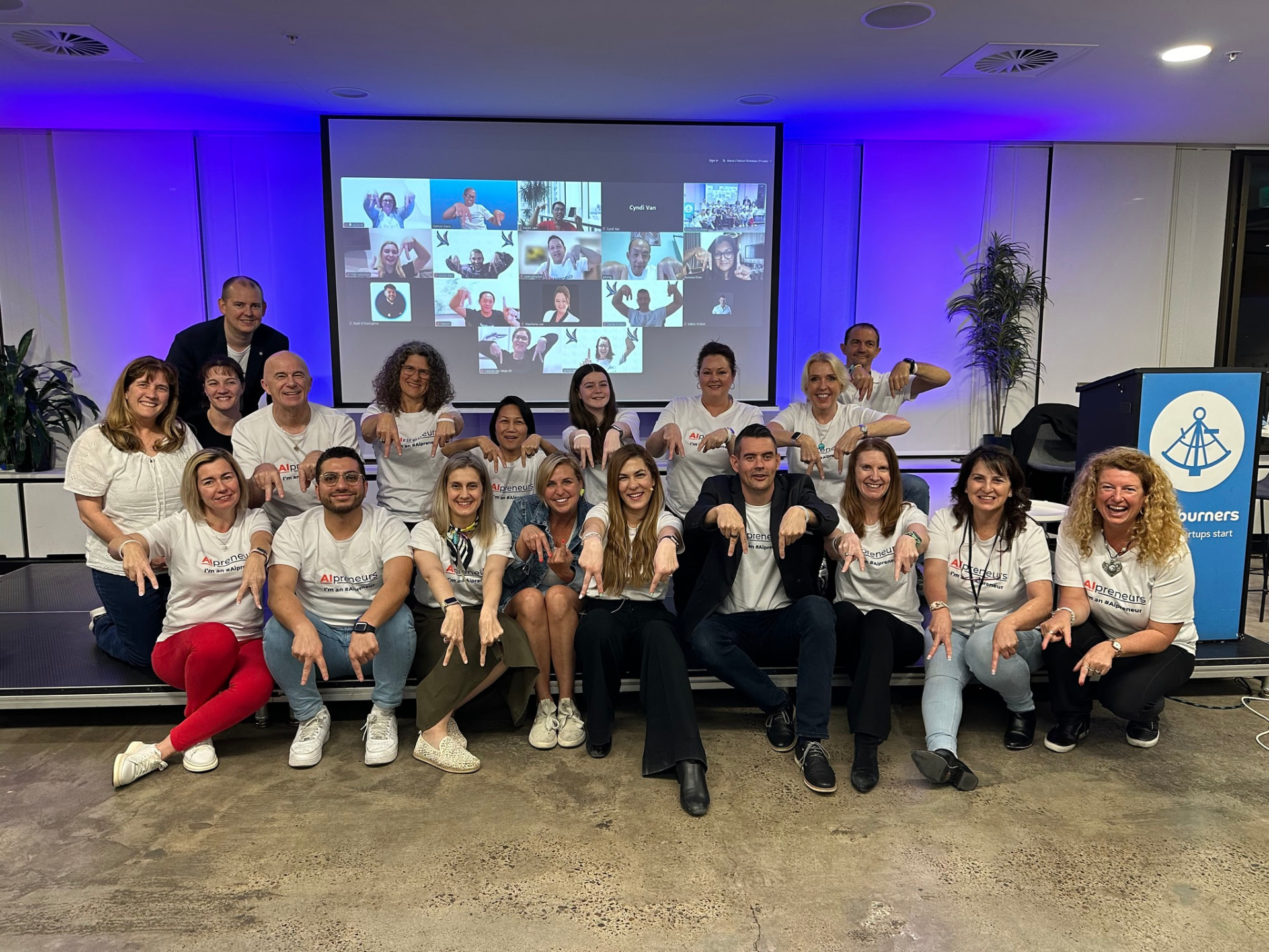 Participants and facilitators at an AIpreneurs bootcamp